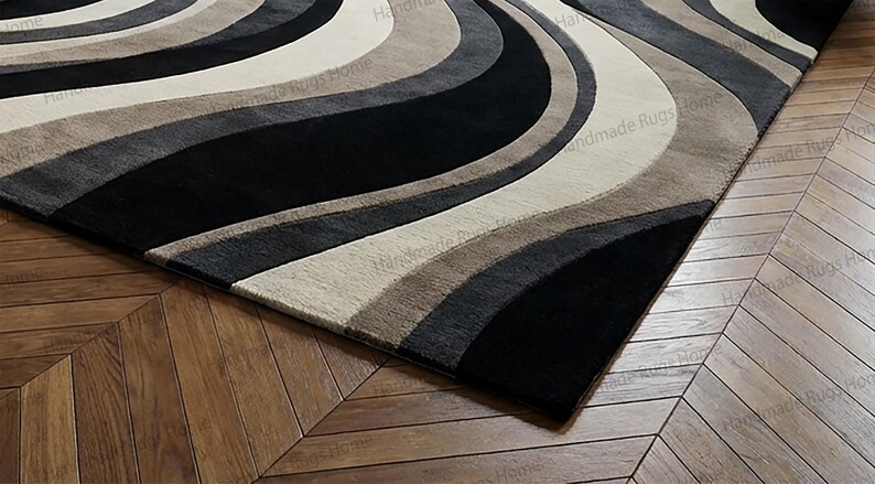 Modern designer rug adding contrast to deep blue walls,

Abstract sculptural carpet ideal for contemporary décor,

Plush textured wool area rug with dramatic color flow,

Elegant monochrome floor accent in luxury apartment,

Statement interior styling with premium tufted rug