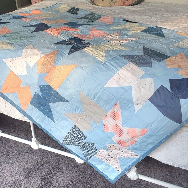 Handmade modern stars patchwork quilt in baby pink and blue