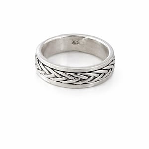 May include: A silver ring featuring a woven pattern around the band. The ring has a polished finish and the number "925" is stamped inside. The ring is likely made of sterling silver.