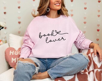 Pull pour amoureux des livres | livresque | lecteurs | marchandise livresque | cadeau livresque | noël | booktok | libraire