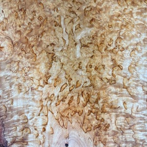 Karelian masur birch boards with live edges. Exotic hardwood lumber. Rare woods. Burl wood.