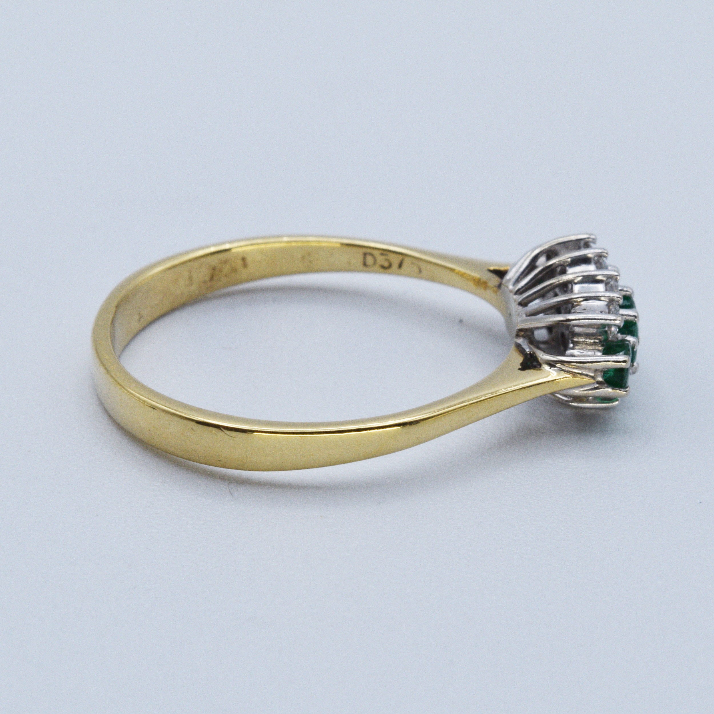 A traditional Emerald and Diamond cluster ring -SOLD OUT