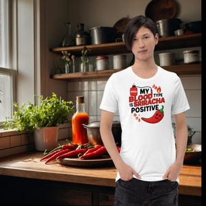 My Blood Type is Sriracha Positive T-Shirt – Funny Hot Sauce Lover Shirt – Chili Sauce Gift Tee – Spicy Foodie Humor T-Shirt for Men & Women