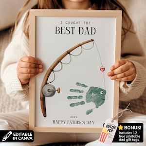 May include: A framed print featuring a brown fishing rod illustration and a green handprint shaped like a fish. The text reads I CAUGHT THE BEST DAD, 20XX, and HAPPY FATHER'S DAY. A small tag attached to the frame says THERE'S NO BUTTER POP THAN YOU.