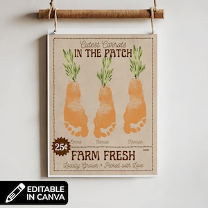 May include: A framed print featuring three orange carrot designs made from footprints, with green tops. The text reads "Cutest Carrots in the Patch," "Farm Fresh," and the names Emma, Samuel, and Hannah. The print is hanging from a wooden rod.