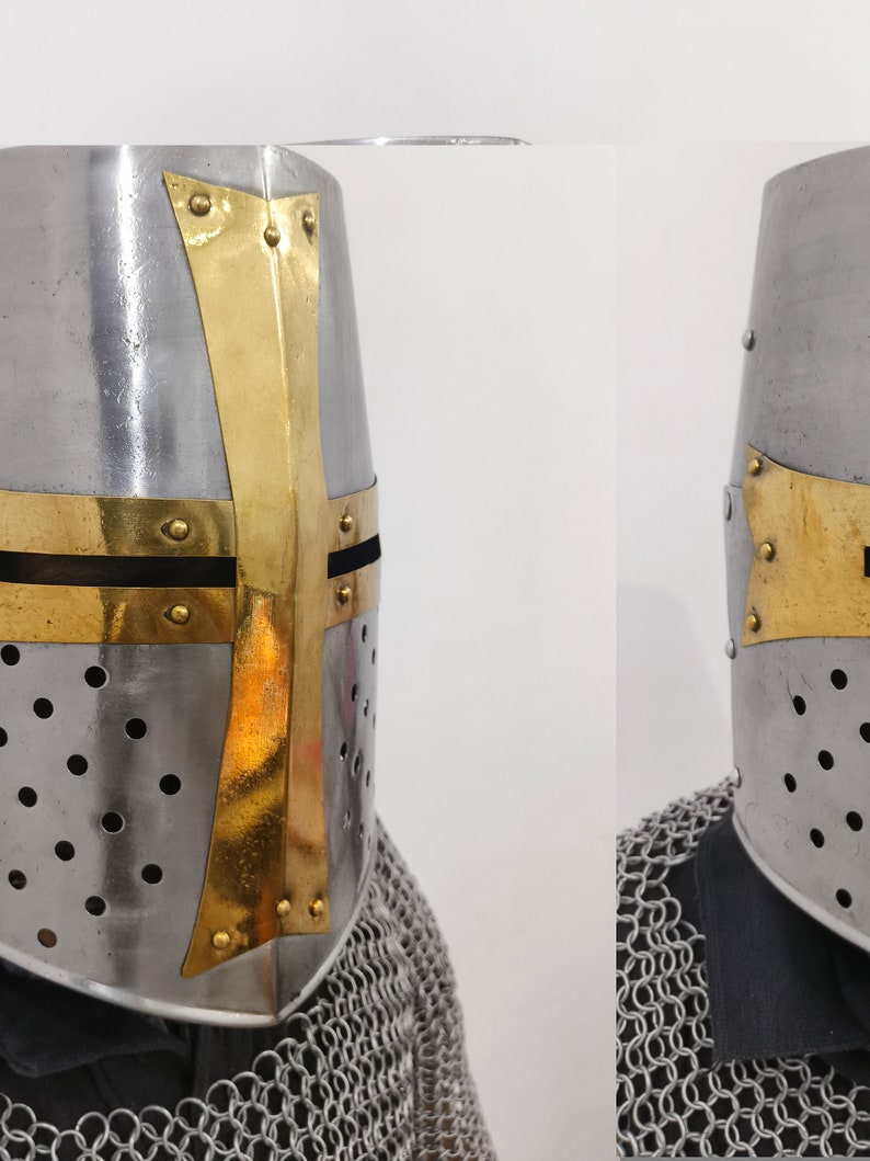 May include: A silver and gold crusader helmet with a chainmail collar. The helmet has a cross design on the front and a small visor.