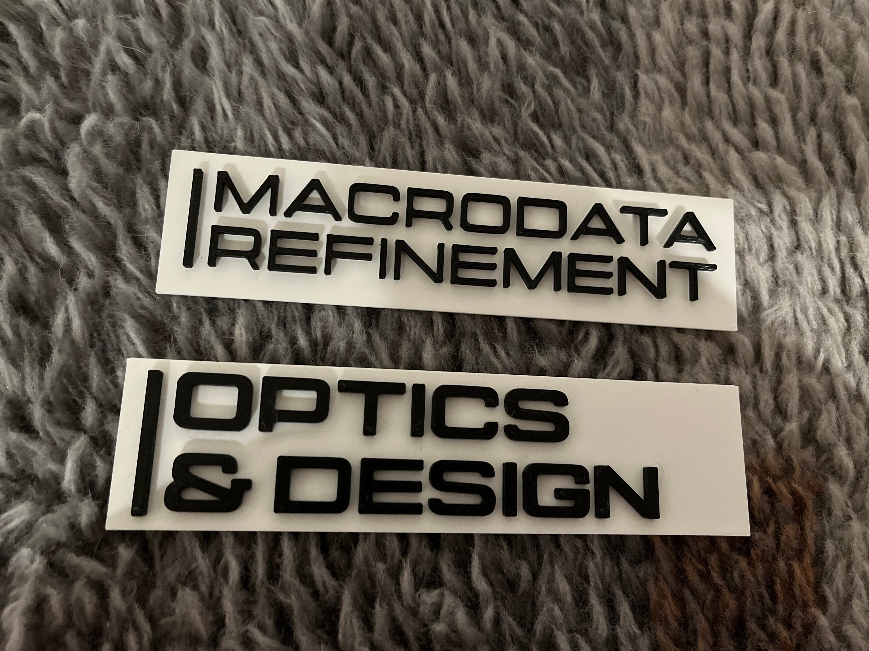 Two-Pack Macrodata Refinement and Optics Design sign O&D bundle