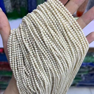 Natürliche Elfenbein Jade facettierte runde Perlen für die Schmuckherstellung (2-4 mm)