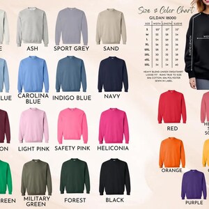 May include: A color chart displays Gildan 18000 unisex sweatshirts in various colors, including white, ash, sport grey, and navy. The chart also shows size measurements for width, length, and sleeve length. The sweatshirts are made of a cotton and polyester blend.