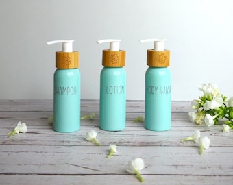 Travel toiletries set x3 bottles 100ml. Choose +15 colours & 6 design styles. Reusable aluminum bottles for shampoo, soap or lotion.
