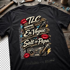 May include: A black t-shirt featuring a graphic print with the text TLC, En Vogue, and Salt-N-Pepa. The design includes illustrations of a cassette tape, a boombox, two microphones, red lips, and yellow lightning bolts on a leopard print ribbon.