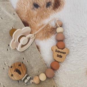 May include: A rustic wooden sign with the text "Welcome to our home" in a handwritten style. The sign has a distressed finish and a simple, inviting design, ideal for a front porch or entryway.