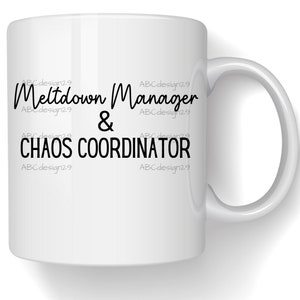 May include: White ceramic coffee mug with black text that reads "Meltdown Manager & Chaos Coordinator".