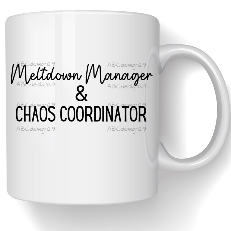 May include: White ceramic coffee mug with black text that reads "Meltdown Manager & Chaos Coordinator".