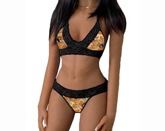 May include: Black lace lingerie set with an orange and white print featuring the text "Tennessee Vols".