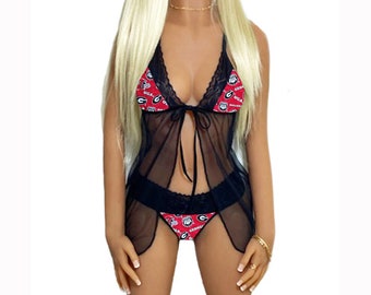 May include: Black lingerie set with a sheer black top and red and black patterned underwear. The underwear has a graphic print of the University of Georgia Bulldogs logo and the words "UGA" and "Georgia Bulldogs".