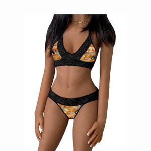 May include: Black lace lingerie set with an orange and white print featuring the text "Tennessee Vols".