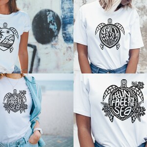 May include: Four white t-shirts with a black turtle design. The turtles have different text inside them, including "Salt Water Heals Everything" and "Feelin Free By The Sea".