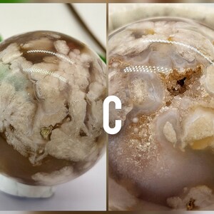 May include: A white and brown agate sphere with a unique, cloudy pattern. The sphere is polished and smooth, with a translucent appearance. The sphere is approximately 5 cm in diameter.