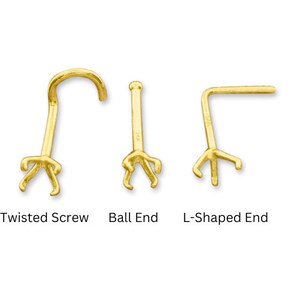 May include: Three gold nose rings with different end styles: twisted screw, ball end, and L-shaped end.