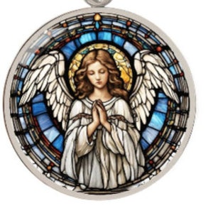 a stained glass window with an angel on it