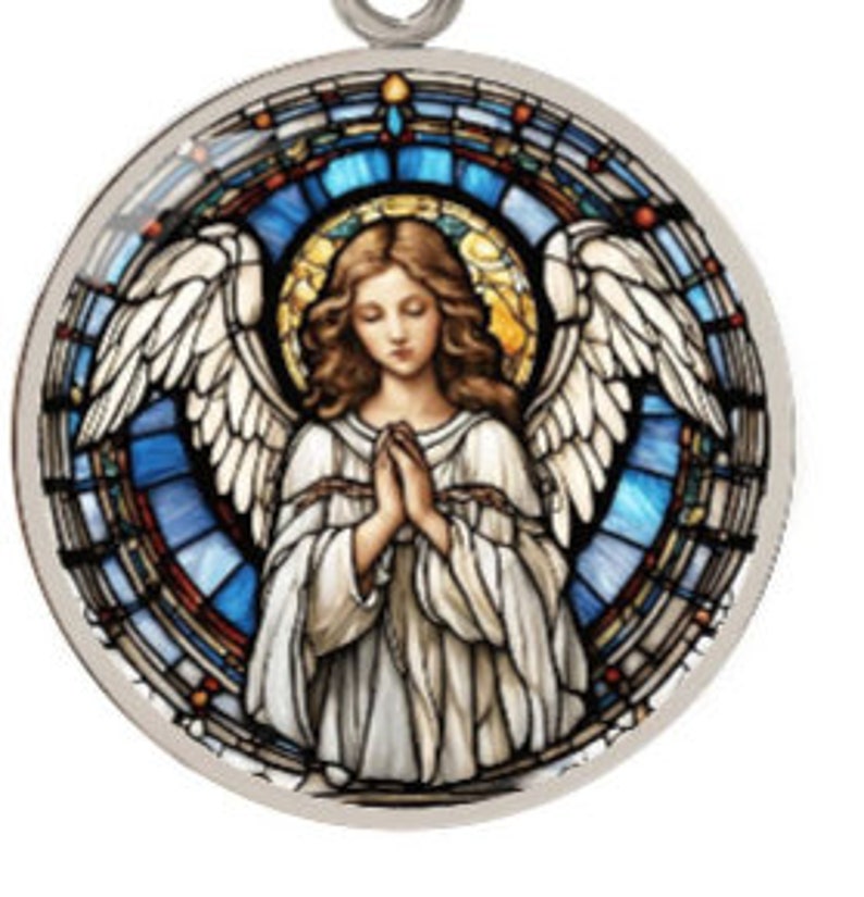a stained glass window with an angel on it