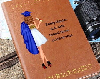 May include: A brown leather journal with gold stars and a graduation cap illustration. The text on the journal reads "Emily Hunter, B.A. Arts, School Name, CLASS OF 2024".