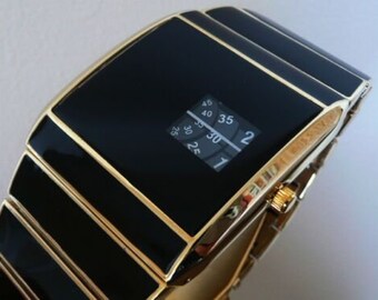 Men s Collector s Nixon the Rotolog Stainless Steel Watch Etsy