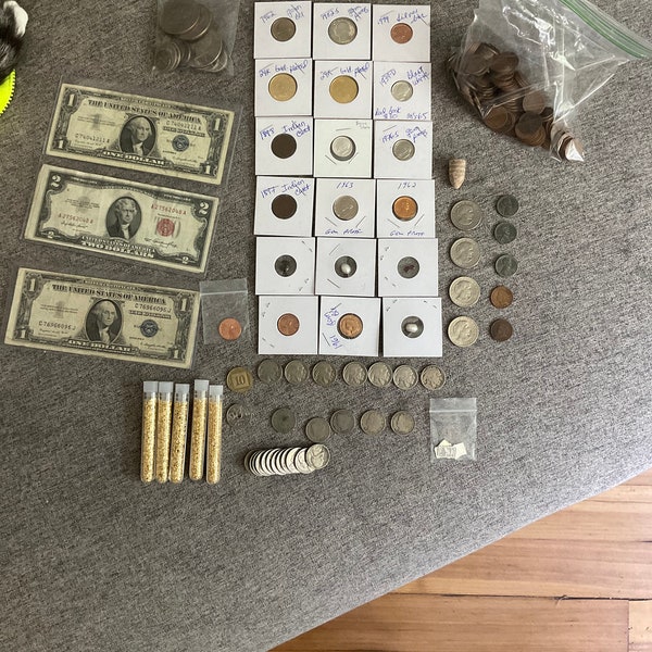 Lot of old currency, silver coins, old dollar bills, 4 error dollar coins, .999 silver bars, gens, gold, even a civil war bullet from 1863!