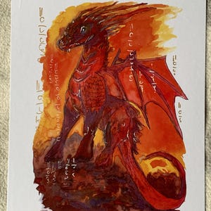 May include: A watercolor painting on paper depicting a red dragon standing against an orange and yellow background. The dragon features textured scales, wings, and a long tail. White, linear, runic-style symbols are painted around the dragon.