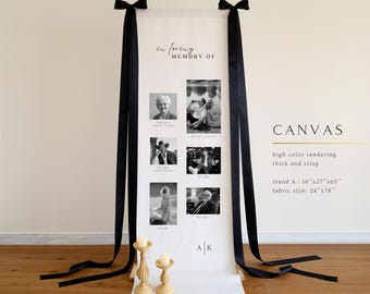 May include: A white vertical memorial canvas banner featuring the text IN LOVING MEMORY OF, six black and white photographs, and the initials A K. The banner is accented with long black ribbons and stands 24 inches by 78 inches.