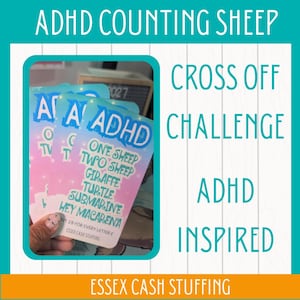 May include: A rectangular paper card with a pink and blue gradient background featuring the text ADHD, ONE SHEEP, TWO SHEEP, GIRAFFE, TURTLE, SUBMARINE, HEY MACARENA, and SAVE £5 FOR EVERY LETTER £ ESSEX CASH STUFFING printed in dark blue and white.