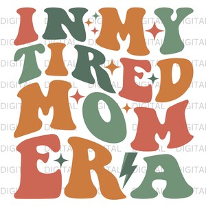 May include: In My Tired Mom Era graphic with a retro font style. The letters are in shades of green, orange, and red with white stars.