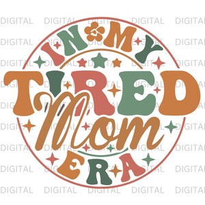 May include: A round, colourful graphic with the text "In My Tired Mom Era" in a retro font. The graphic features stars, flowers, and a rainbow of colours.