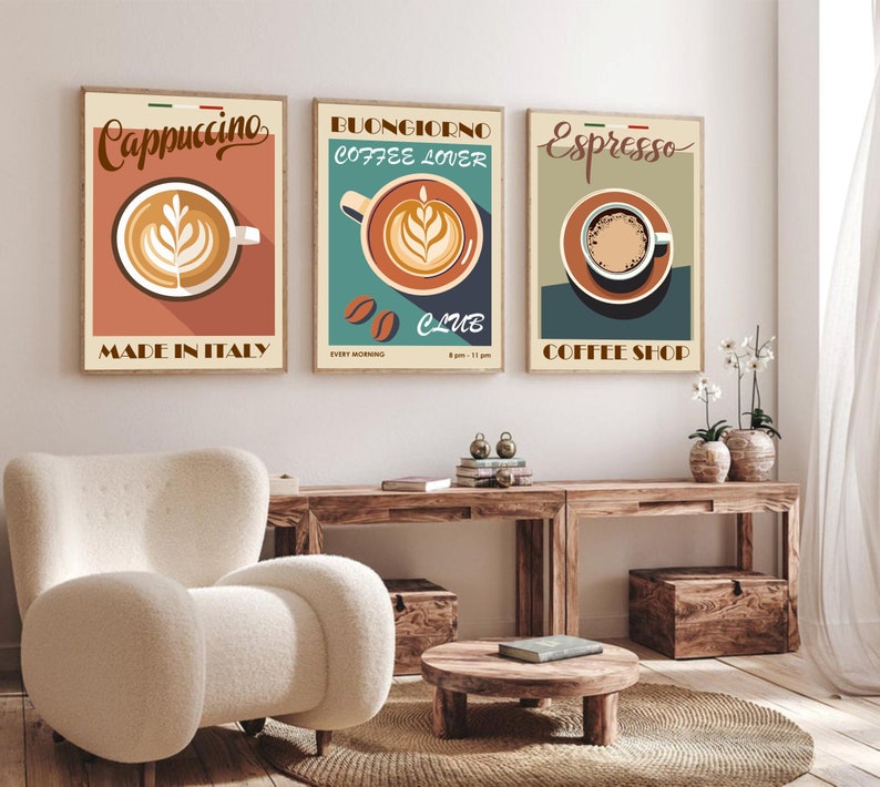 May include: Three vintage-style coffee posters with illustrations of coffee cups and text. The posters are framed and hung on a white wall. The posters are titled "Cappuccino Made in Italy", "Buongiorno Coffee Lover Club", and "Espresso Coffee Shop".