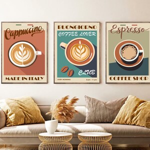 May include: Three vintage-style coffee shop posters with illustrations of coffee cups. The posters are framed in wood and have a red, white, and green Italian flag design. The posters feature the words "Cappuccino", "Buongiornio Coffee Lover Club", and "Espresso Coffee Shop".