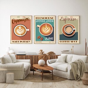 May include: Three vintage-style coffee shop posters with illustrations of coffee cups. The posters are framed and hung on a white wall. The posters are titled "Cappuccino", "Buongiorno Coffee Lover", and "Espresso".