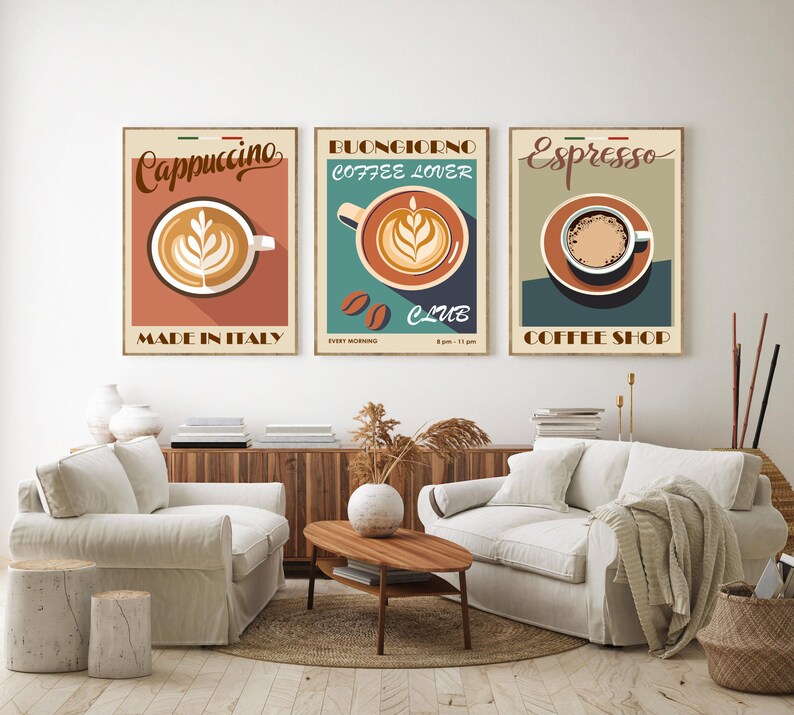 May include: Three vintage-style coffee shop posters with illustrations of coffee cups. The posters are framed and hung on a white wall. The posters are titled "Cappuccino", "Buongiorno Coffee Lover", and "Espresso".