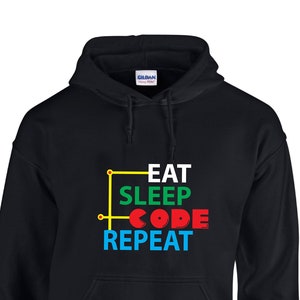 May include: Black hooded sweatshirt with the text "Eat Sleep Code Repeat" in a colorful block font.