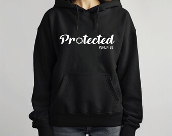 May include: Black hooded sweatshirt with a white graphic that says "Protected Psalm 91".