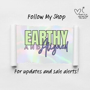 May include: A graphic design with the text "EARTHY AND Aligned" in a green and purple color scheme on a holographic background. The text "Follow My Shop" appears above the graphic and "For updates and sale alerts!" appears below the graphic.