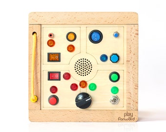 Play Forward Busy Buttons LED Activity Panel for 18+ Month-Old Toddlers — Montessori for an On-The-Go Sensory Toy