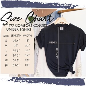 May include: Size chart for a unisex t-shirt in various sizes. The chart shows the length and width of the shirt in inches for sizes S, M, L, XL, 2X, and 3X. The chart is printed on a white background with black text.