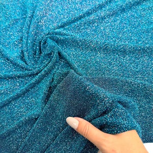 Tissu Lurex extensible dans 4 directions turquoise par mètre tricoté Spandex scintillant multicolore bleu pailleté pour la couture tissu de vêtements de danse