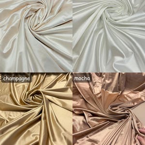 K&ouml;nnte beinhalten: Vier Stoffproben aus Satin in verschiedenen Farben: Off-White, Wei&szlig;, Champagner und Mokka.