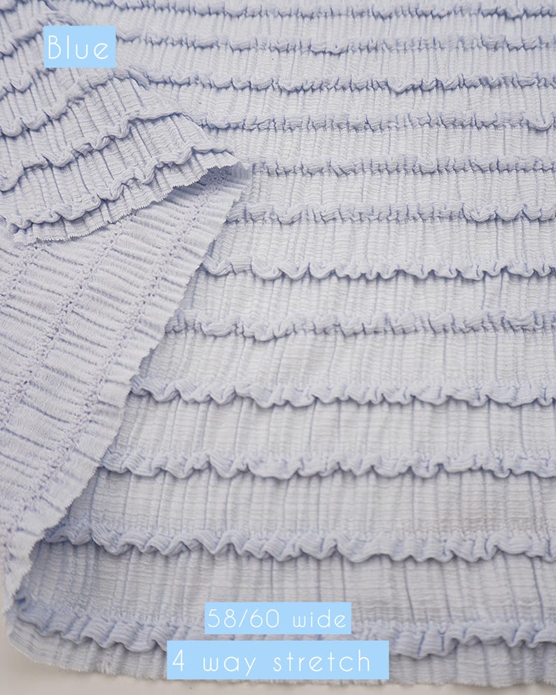 Powder blue smocked stretch fabric. Crinkle bubble knit material for baby headbands, swimwear coverups, and summer apparel.