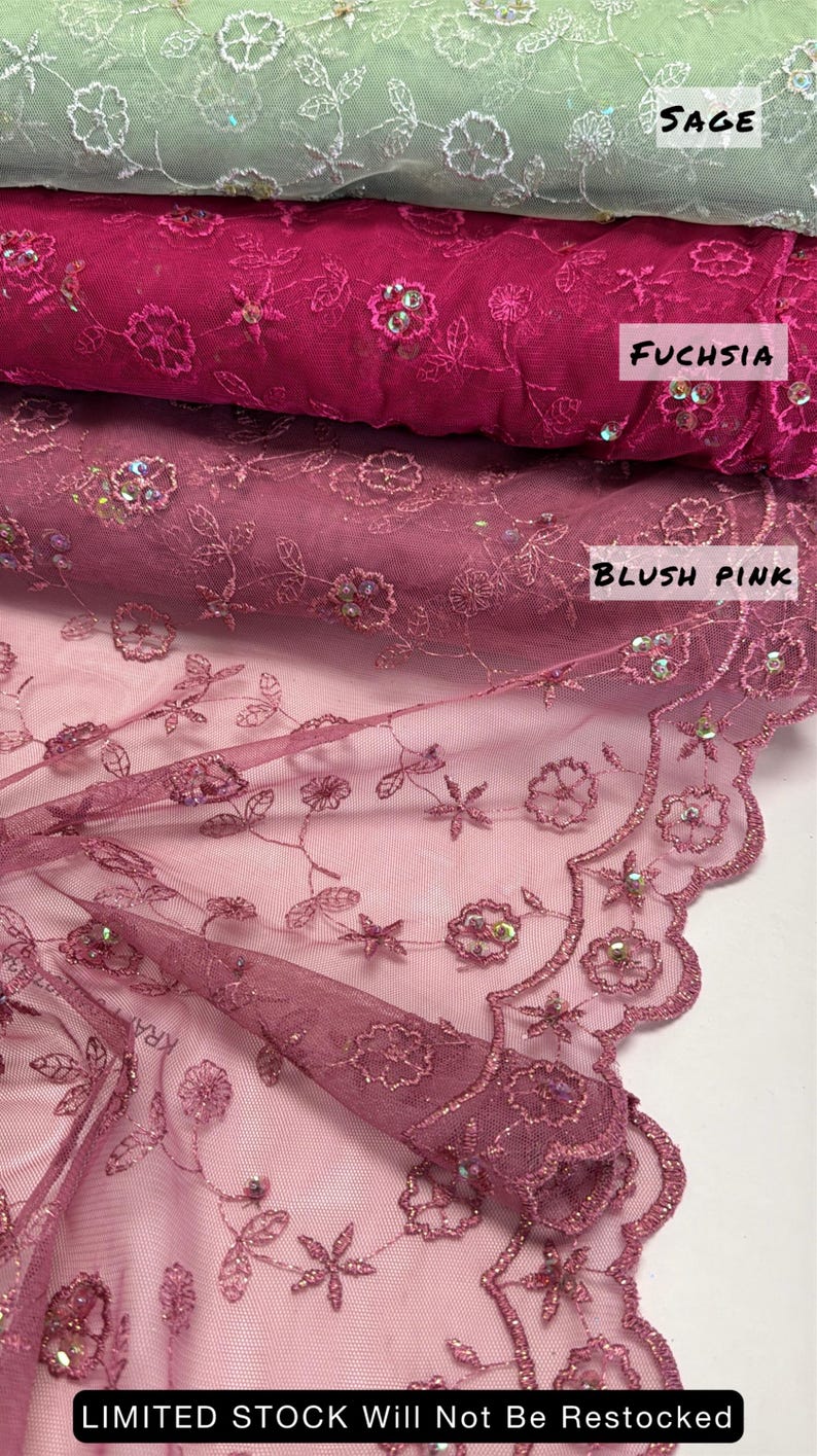Peut inclure: Gros plan sur trois rouleaux de tissu brod&eacute; vert sauge, fuchsia et rose blush. Le tissu est orn&eacute; de motifs floraux et de feuilles et agr&eacute;ment&eacute; de paillettes. Le texte "LIMITED STOCK Will Not Be Restocked" est en bas.