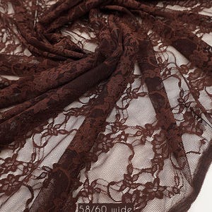 Deep brown vintage floral lace for boho fashion and autumn apparel designs. 80 GSM weight provides excellent recovery and soft texture.