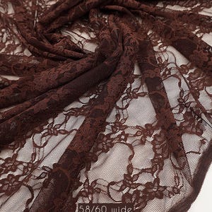 Deep brown vintage floral lace for boho fashion and autumn apparel designs. 80 GSM weight provides excellent recovery and soft texture.