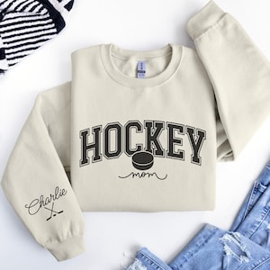 Custom Hockey Mom Sweatshirt with Name on Sleeve, Personalized Hockey Mom Shirt, Hockey Season Game Day Crewneck Sweater, Hockey Mom Gifts